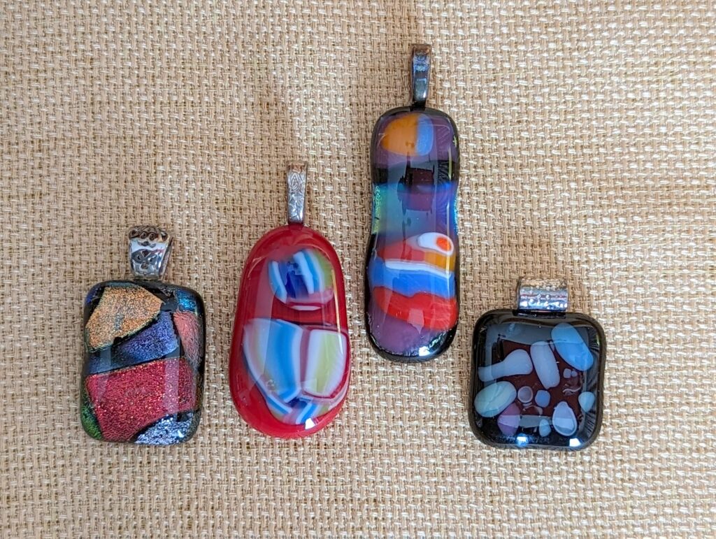 4 glass colorful pendants