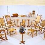 Wood chairs, stools, end tables, and trays by artist Douglas Starry