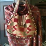 Woven bag with geometric shapes