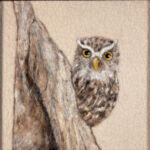 Felt owl on tree by artist Nancy Gibbs