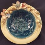 Ceramic plate with foliage details by artist Lenni Gritz