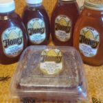 Collage of honey, bee on flower, and honecomb