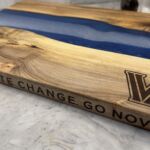 Cutting board with blue detail by artist Jim Cordes