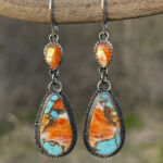 Colorful orange and turquoise drop earrings by artist Michele Cole