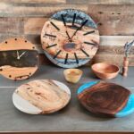 Wood clocks and trays by artist Suzanne Crawford