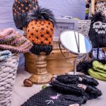 Knit hats displayed on a table